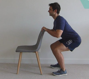 body weight squat with a chair
